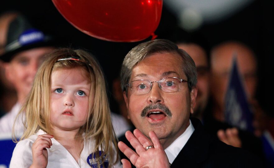 Former Iowa Gov. Terry Branstad celebrates his GOP primary victory with granddaughter MacKenzie.