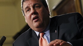 New Jersey Gov. Chris Christie listens to a question in Trenton, N.J., Tuesday. He has refused to tip his hand on whether New Jersey will set up a federally mandated health insurance exchange or let the federal government handle the chores.