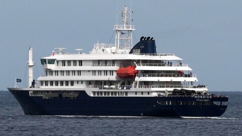 The MV Hondius cruise ship departs the port in Praia, Cape Verde, Wednesday, May 6, 2026.