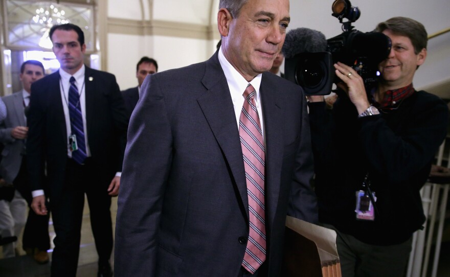 Speaker of the House John Boehner arrives at the U.S. Capitol on Monday. House Republicans remain an obstacle to any emerging deal.