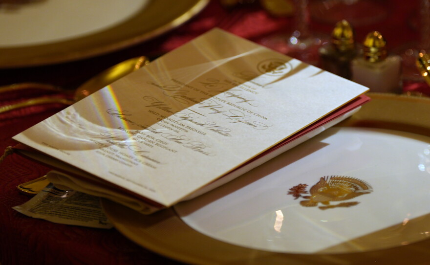 The menu is seen at a seat as President Donald Trump hosts a State Dinner for China's President Xi Jinping in the East Room of the White House, Thursday, Sept. 24, 2026, in Washington.