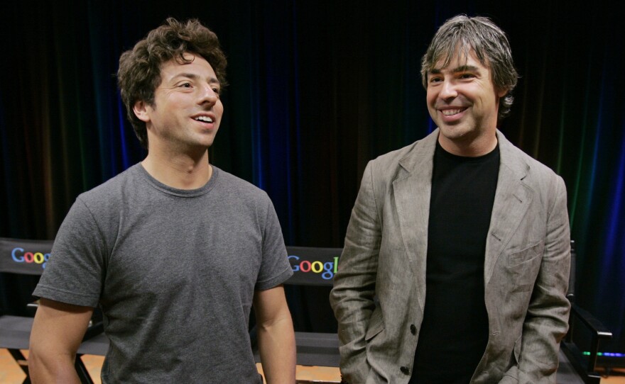 Google co-founders Sergey Brin (left) and Larry Page announced Tuesday they are stepping down from their leadership roles but will remain board members of Alphabet, Google's parent company.