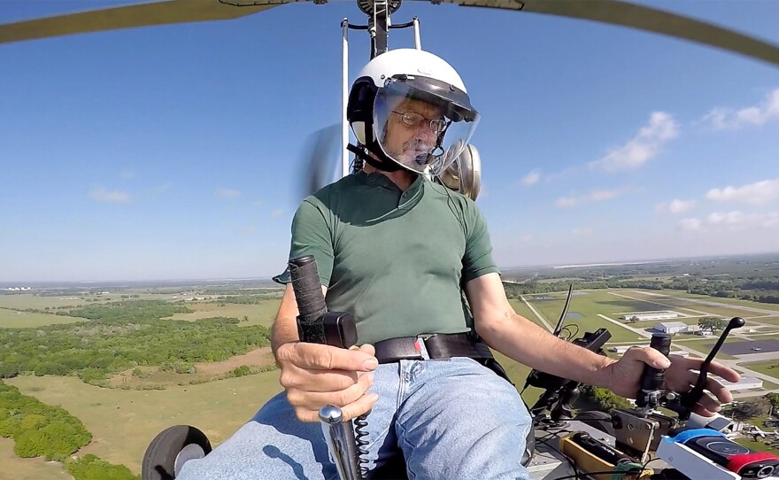 Doug Hughes flies his gyrocopter March 17 near the Wauchula Municipal Airport in Wauchula, Fla.