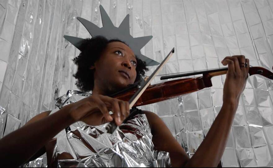 Musician Shayla James performs in a dance film piece that's part of Disco Riot's "Move American." The films will screen Saturday, Oct. 3 in the Art Produce garden.