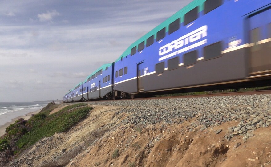 A Coaster train running through a neighborhood in Del Mar, April 14, 2021.