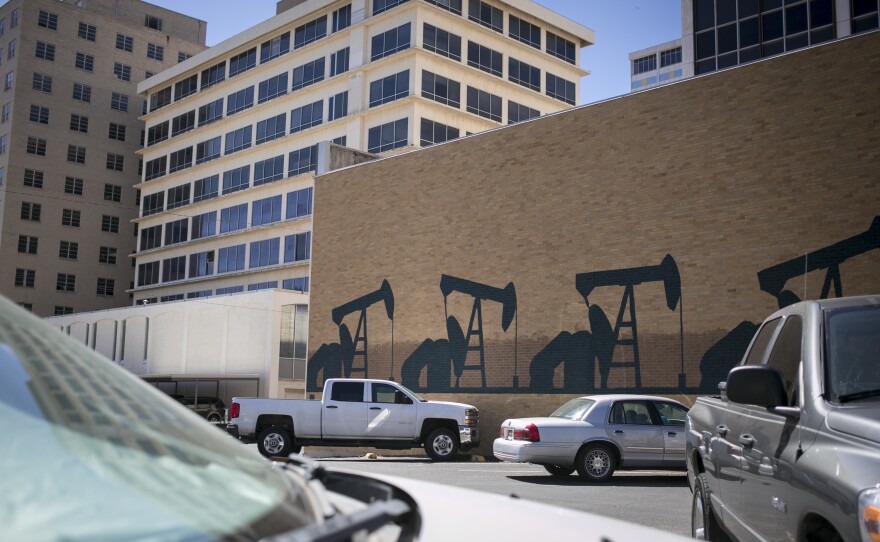 Pump jacks decorate the side of a building in downtown Midland.