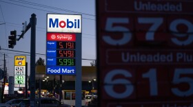 Gasoline prices are displayed at a Mobil gas station on April 29 in Portland, Ore.
