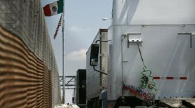 Trucks line up at the Corboba - LasAmericas international bridge to cross with their cargo from Mexico into the United States, in Ciudad Juarez, Mexico, Friday, May 31, 2019. 