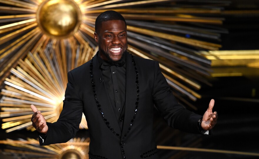 Actor and comedian Kevin Hart speaks onstage at the Academy Awards in 2016. Hart was slated to host the 2019 Oscars but withdrew after he was criticized for controversial jokes he made in 2010.