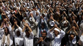 Anti-government protesters attend a rally to demand the ouster of Yemen's President Ali Abdullah Saleh in Sanaa on June 3.
