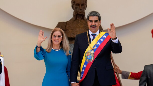 Venezuelan President Nicolas Maduro and his wife Cilia Flores wave after his swearing-in ceremony for a third term at the National Assembly in Caracas, Venezuela, on Jan. 10, 2025.