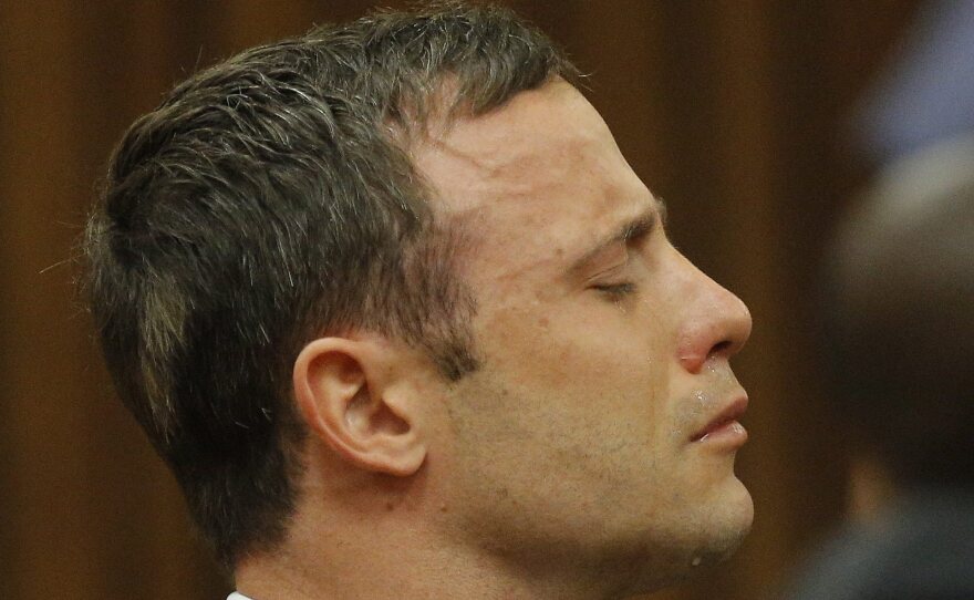 South African athlete Oscar Pistorius cries while the verdict is being read during his murder trial, in Pretoria, South Africa, on Thursday.