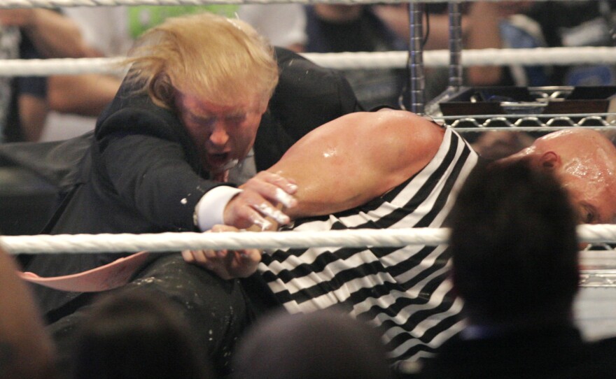 Donald Trump wrestling with 'Stone Cold' Steve Austin after the the Battle of the Billionaires at the 2007 World Wrestling Entertainment's Wrestlemania April 1, 2007.