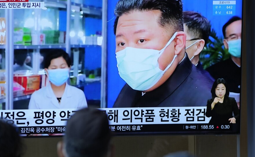 A news program showing North Korean leader Kim Jong Un is broadcast at a train station in Seoul, South Korea this week.
