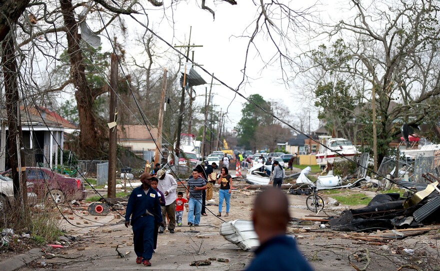 Chef Menture Avenue in New Orleans was littered with debris after severe storms on Tuesday.