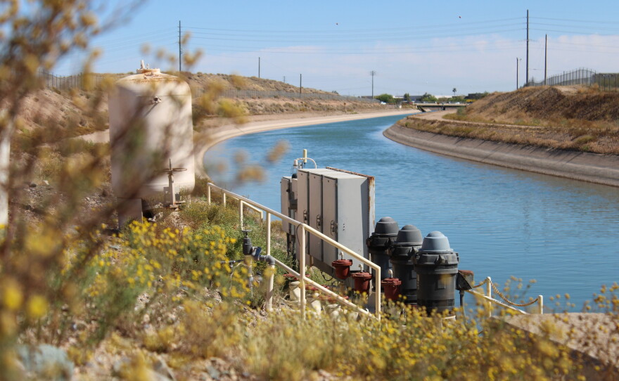 Colorado River water flows through the Central Arizona Project canal in Phoenix on March 27, 2026. Cities in the fast-growing region pull water from the canal to supply homes and businesses, and have argued that planned cutbacks to its water would harm Arizona's economy.