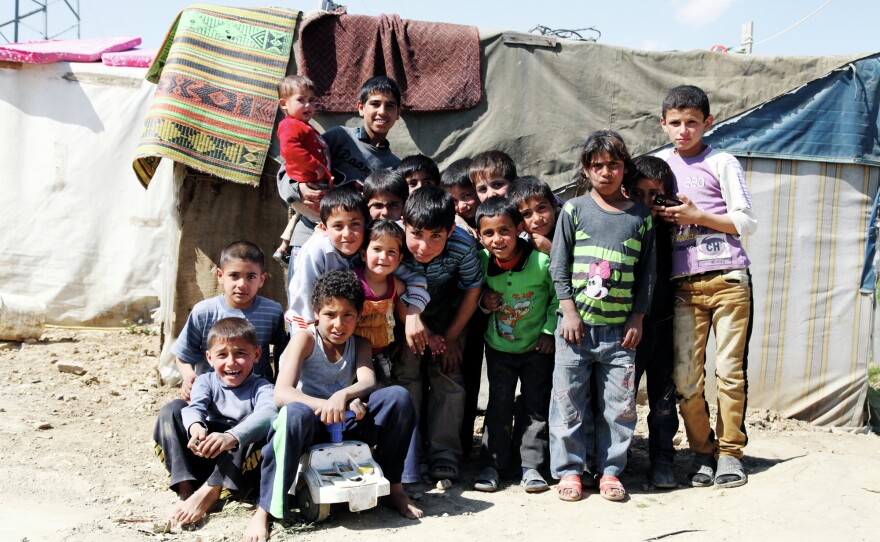 A group of children at the Syrian refugee camp in Lebanon's Bekaa Valley. Cookbook writer and photographer Barbara Massaad visited the camp and was particularly touched by the Syrian children she met there. She wanted to raise awareness about the plight of Syrian refugees, so she decided to write a cookbook.