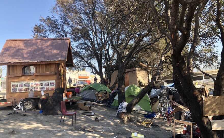 This tent camp is nestled between a freeway, rail tracks and a Burger King near the Fruitvale section of Oakland.