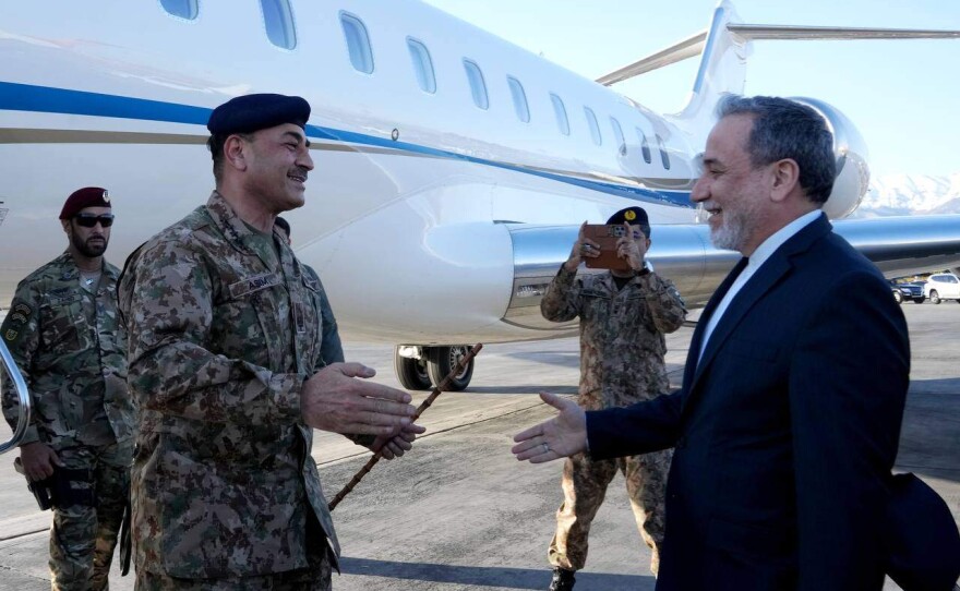 In this photo released by Telegram channel of the Iranian Foreign Minister Abbas Araghchi, Foreign Minister Abbas Araghchi, right, welcomes Pakistan's Army Chief Field Marshal Gen. Asim Munir upon his arrival in Tehran, Iran, Wednesday, April 15, 2026.