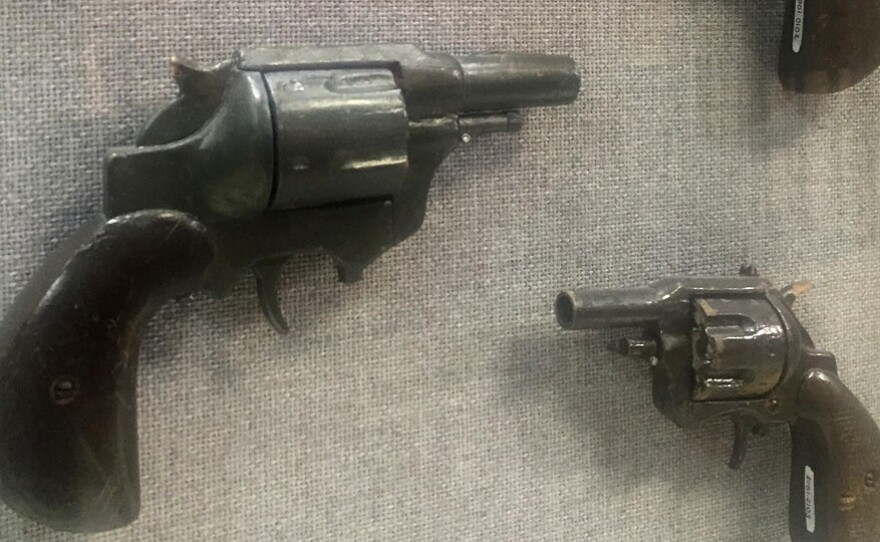Realistic-looking wooden pistols carved and painted by an inmate at the Walls Unit prison in Huntsville, Texas, in 1964. They were intended to be used in an escape attempt but were discovered by employees of the prison.