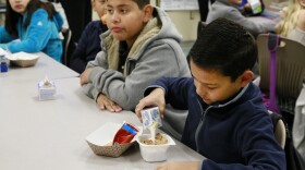 Students are served breakfast at the Stanley Mosk Elementary School in Los Angeles, April 8, 2015. 