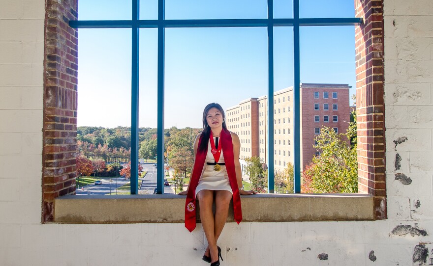 Karie Cheung poses for a graduation portrait at the University of Maryland in College Park, Md.