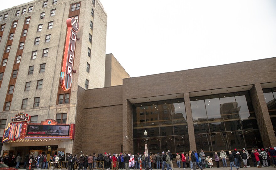 Trump supporters lineup outside the Adler Theater in downtown Davenport, Iowa, on March 13, 2023, to see the former president speak at his first Iowa event since announcing his third presidential bid.