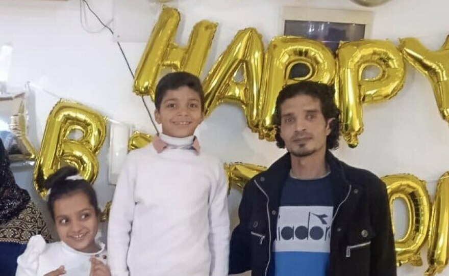 Eman Abusaeid's children, Joudi and Ziyad, and her husband, Iyad.