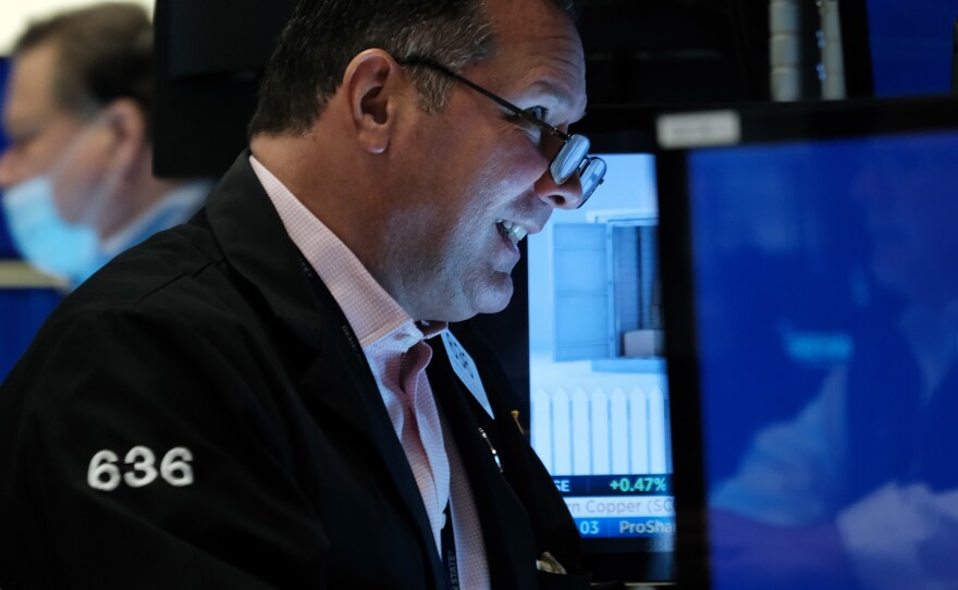 A trader working on the floor of the New York Stock Exchange (NYSE) in New York City on May 2. Stocks surged on Wednesday after the Fed's policy meeting.