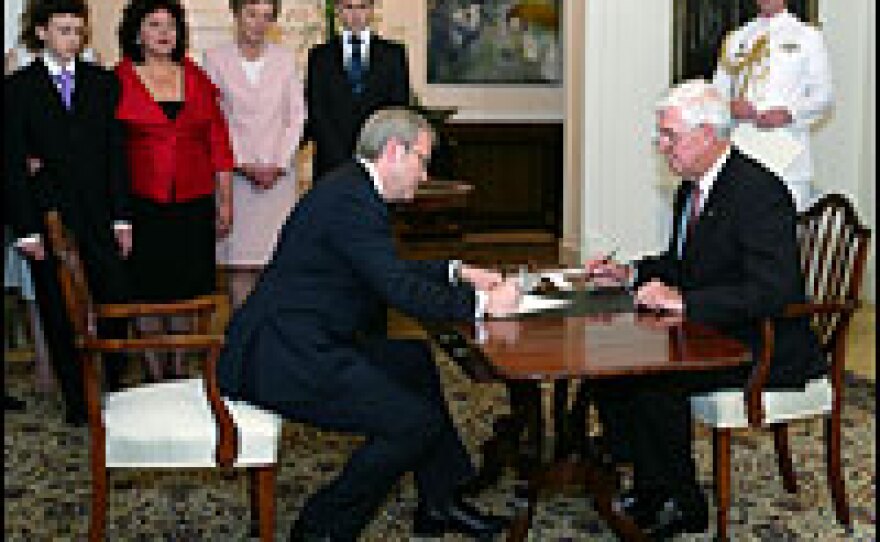 Prime Minister Kevin Rudd is sworn in by Governor General Michael Jeffrey during a ceremony at Government House on Dec. 3, 2007, in Canberra, Australia.