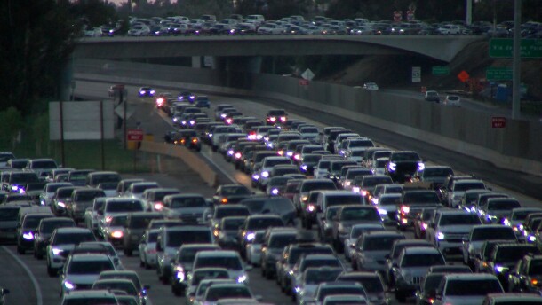 Southbound border traffic brings Interstate 5 and Interstate 805 to a halt in this undated photo. Cross-border commuters say traffic going into Tijuana is worse than ever. Some wait more than two hours to cross into Mexico.