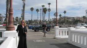 Oceanside Redevelopment Manager, Kathy Baker, stands at the foot of the Oceanside Pier by the empty lot where the city has long planned a hotel resort. Feb 15th 2011