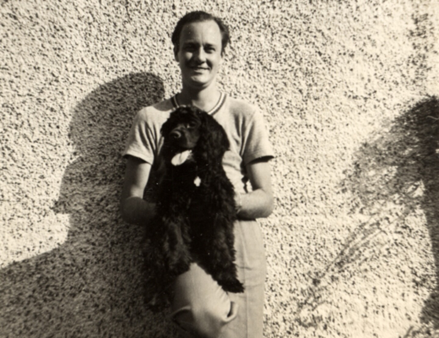 Stan Lee as a young man holding his dog. (undated photo)